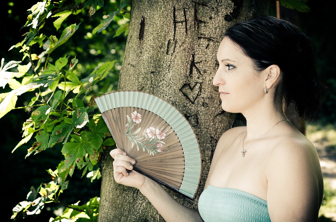 Young man with fan