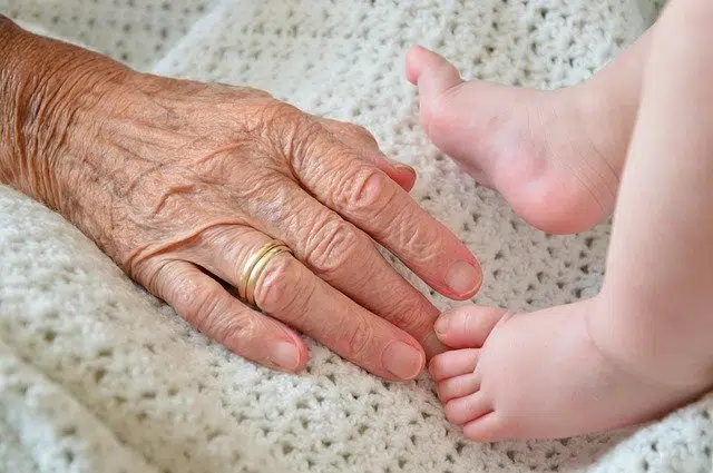 old woman and baby