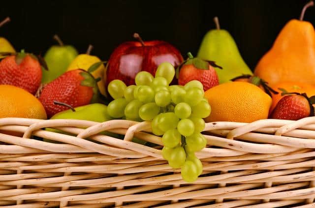 Basket weaving basket with fruits