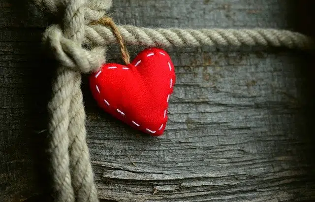 A red heart symbolizes love