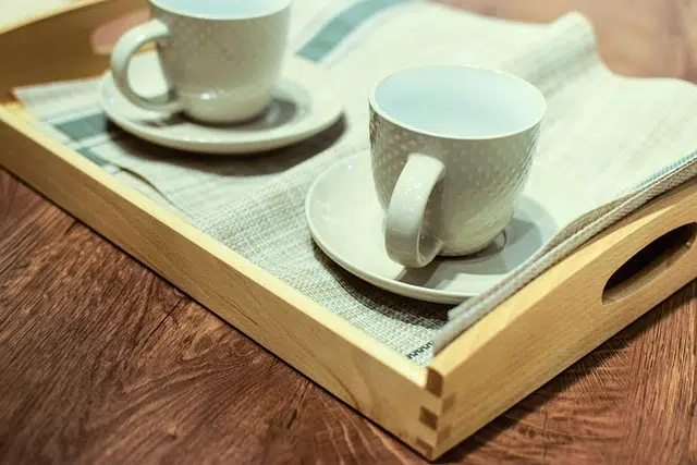 Tray with newspaper and cups