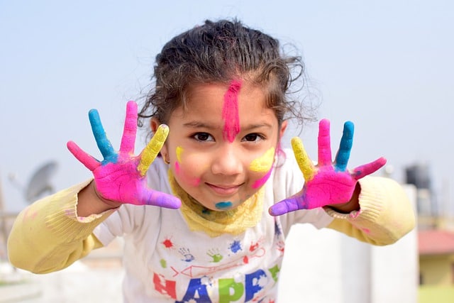 Colorfully painted girl