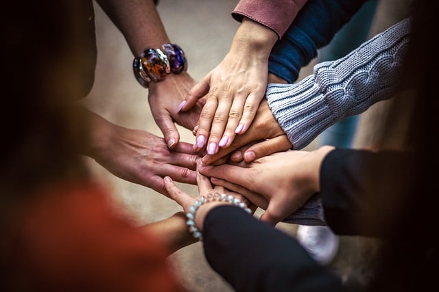 People joining hands