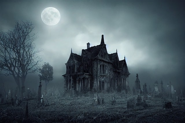 House and cemetery in darkness