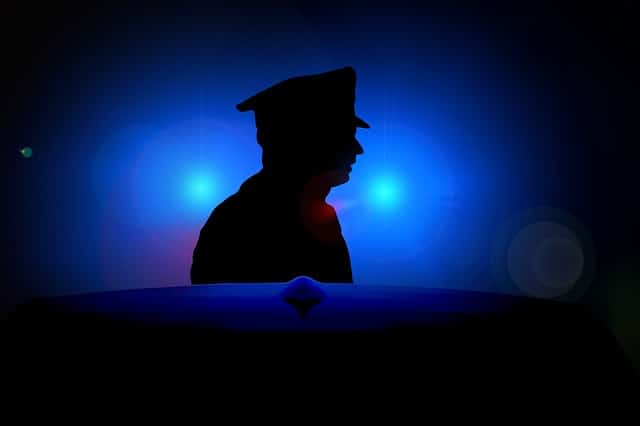 Silhouette of a police officer