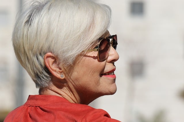 woman white hair sunglasses