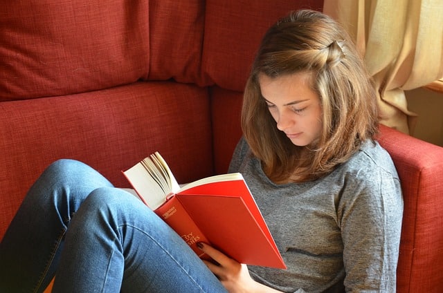 Girl reading on the sofa