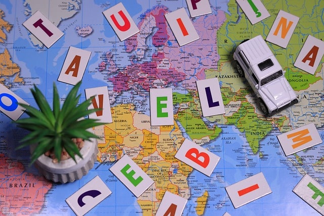 Planisphere map, letters, a toy car and a plant