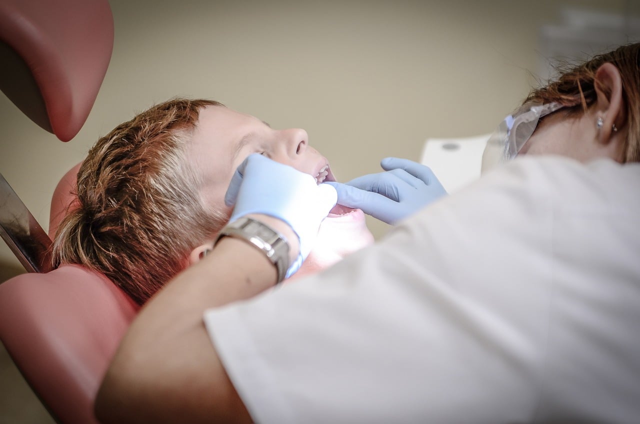 Child being treated by a doctor