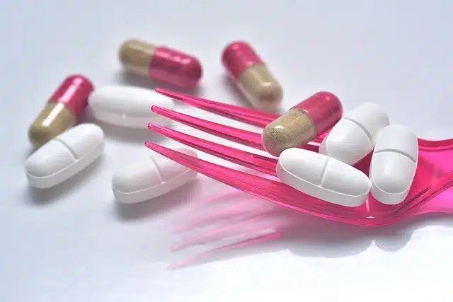 Pink fork and pills