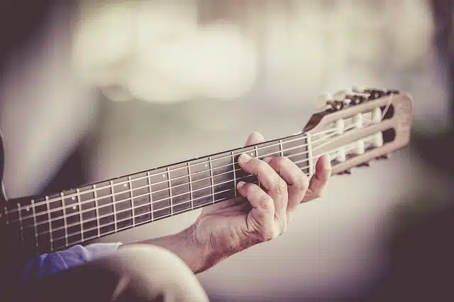 person playing guitar