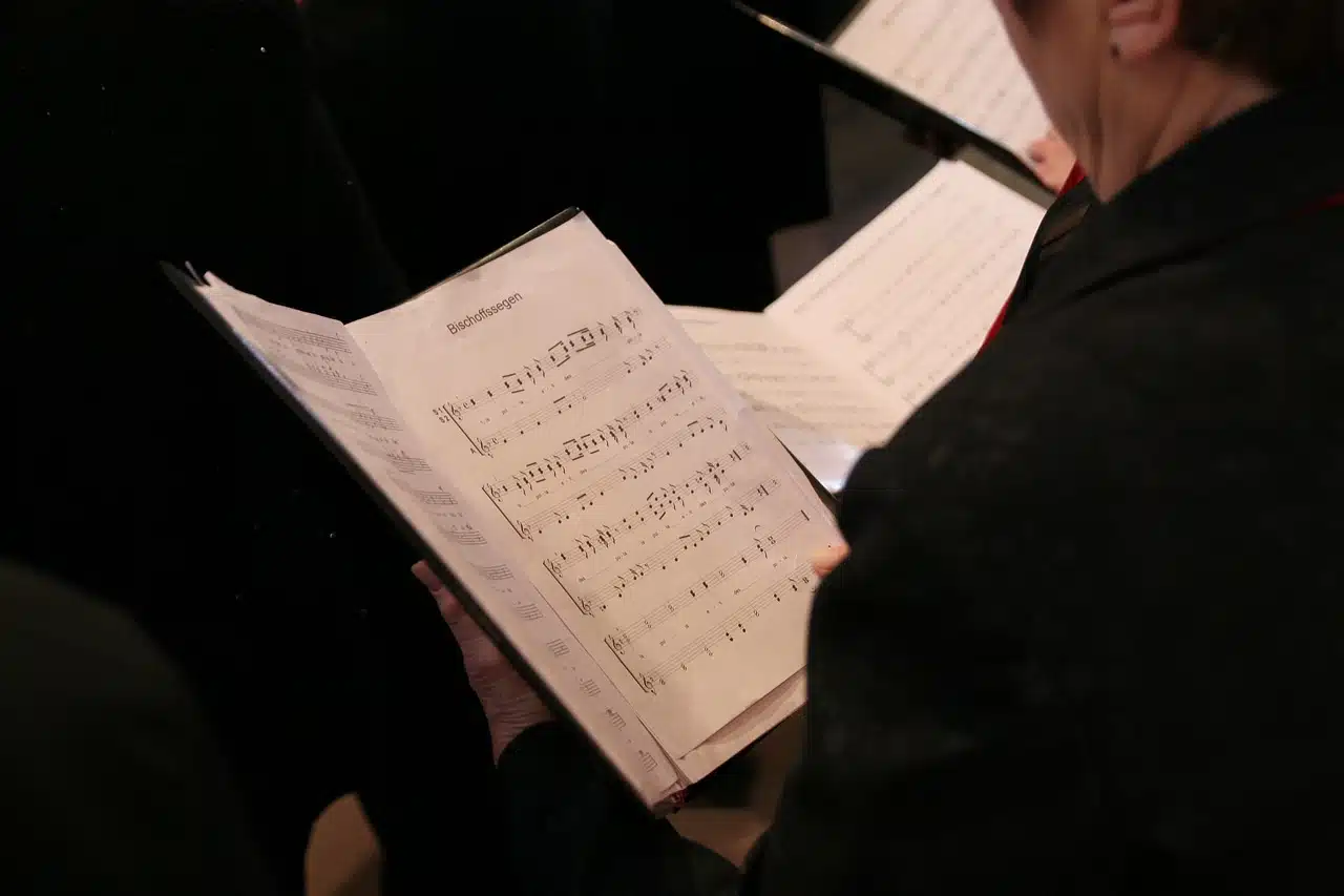 Choir singer reading a sheet music