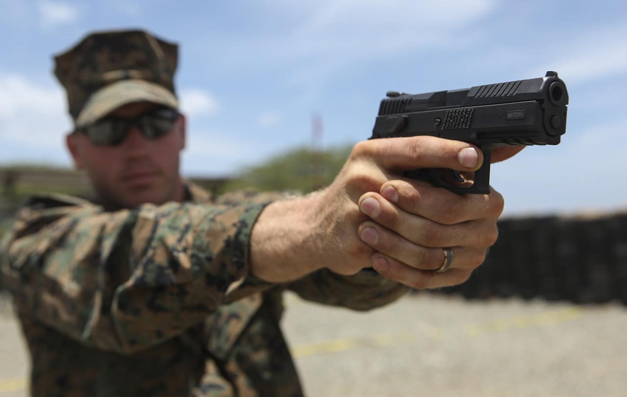 Soldier aiming a gun