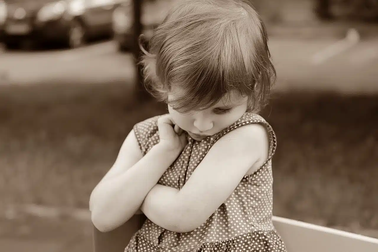 Shy girl (sepia photograph)