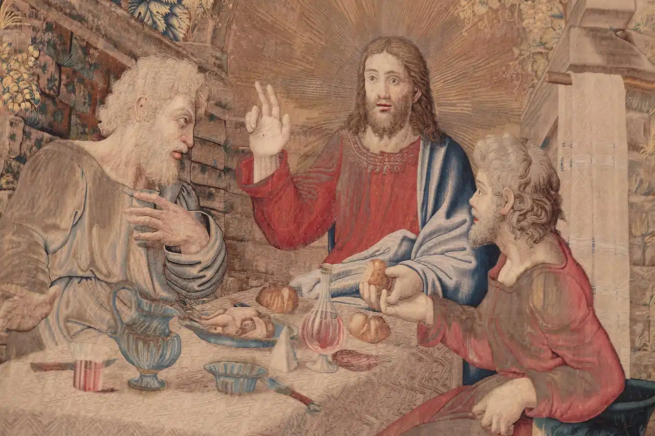 Jesus Christ having dinner with two followers