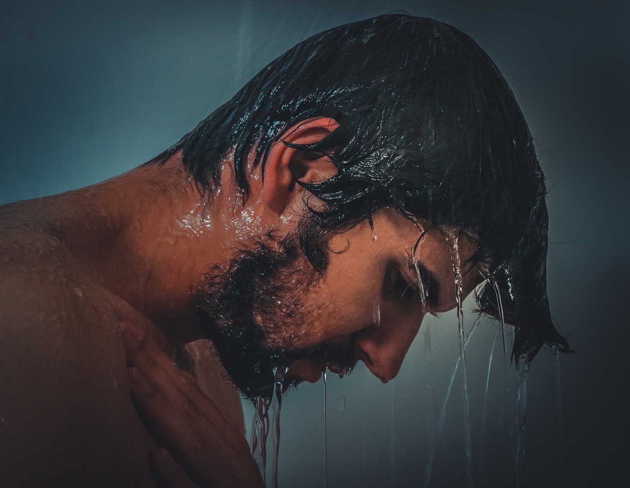 Man washing his hair