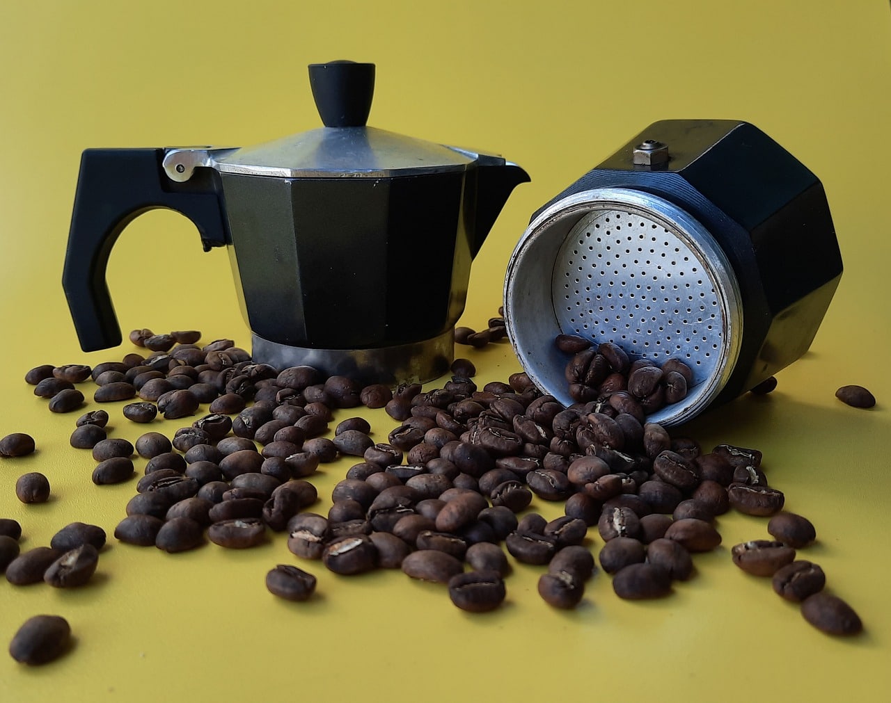 Coffee pot with coffee beans