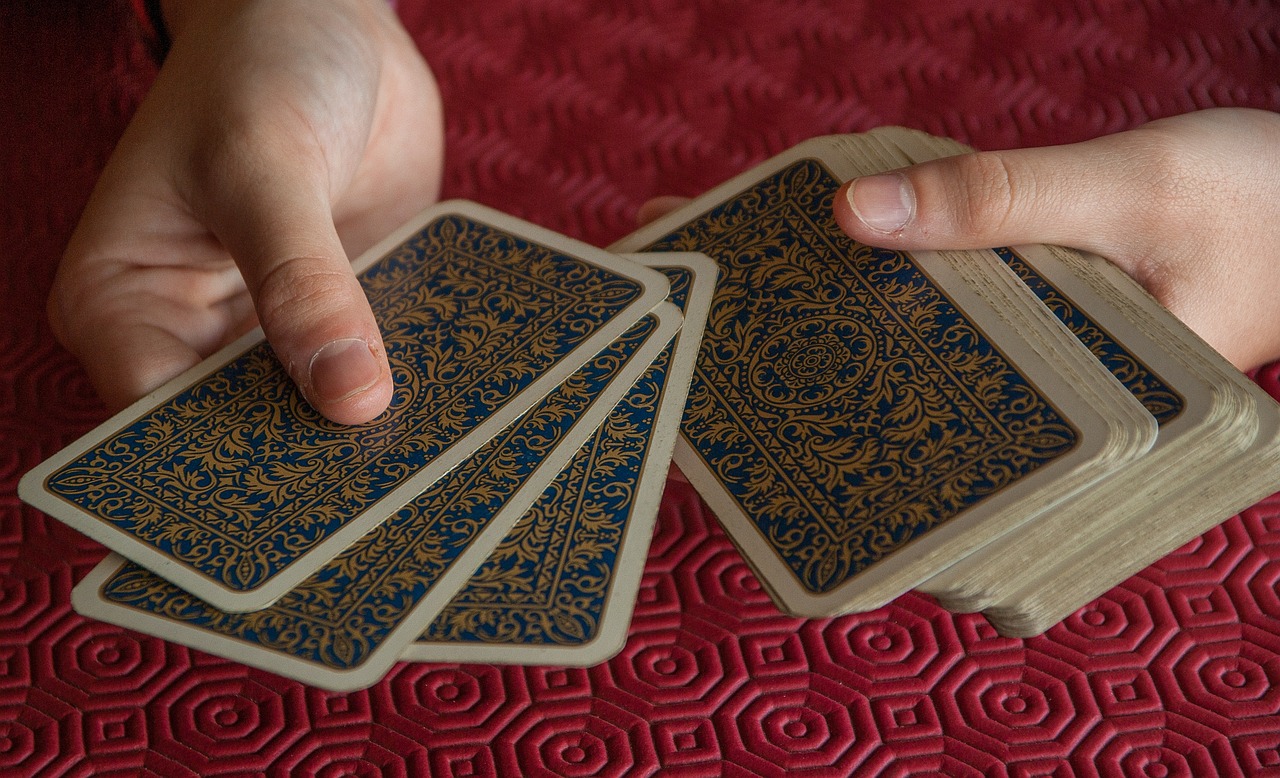 Person shuffling cards