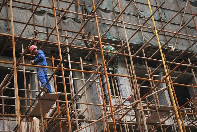 Scaffold workers working