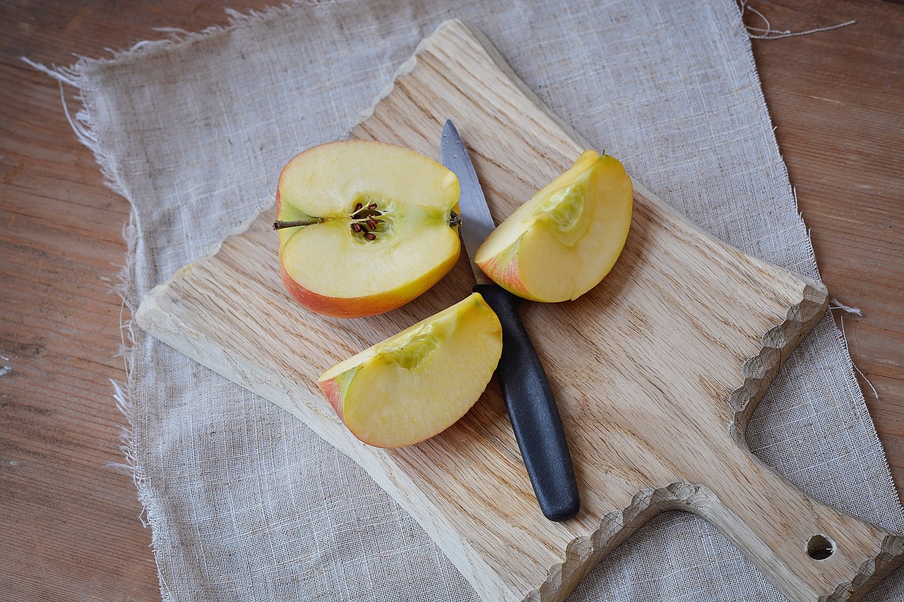 Chopped apple on cutting board