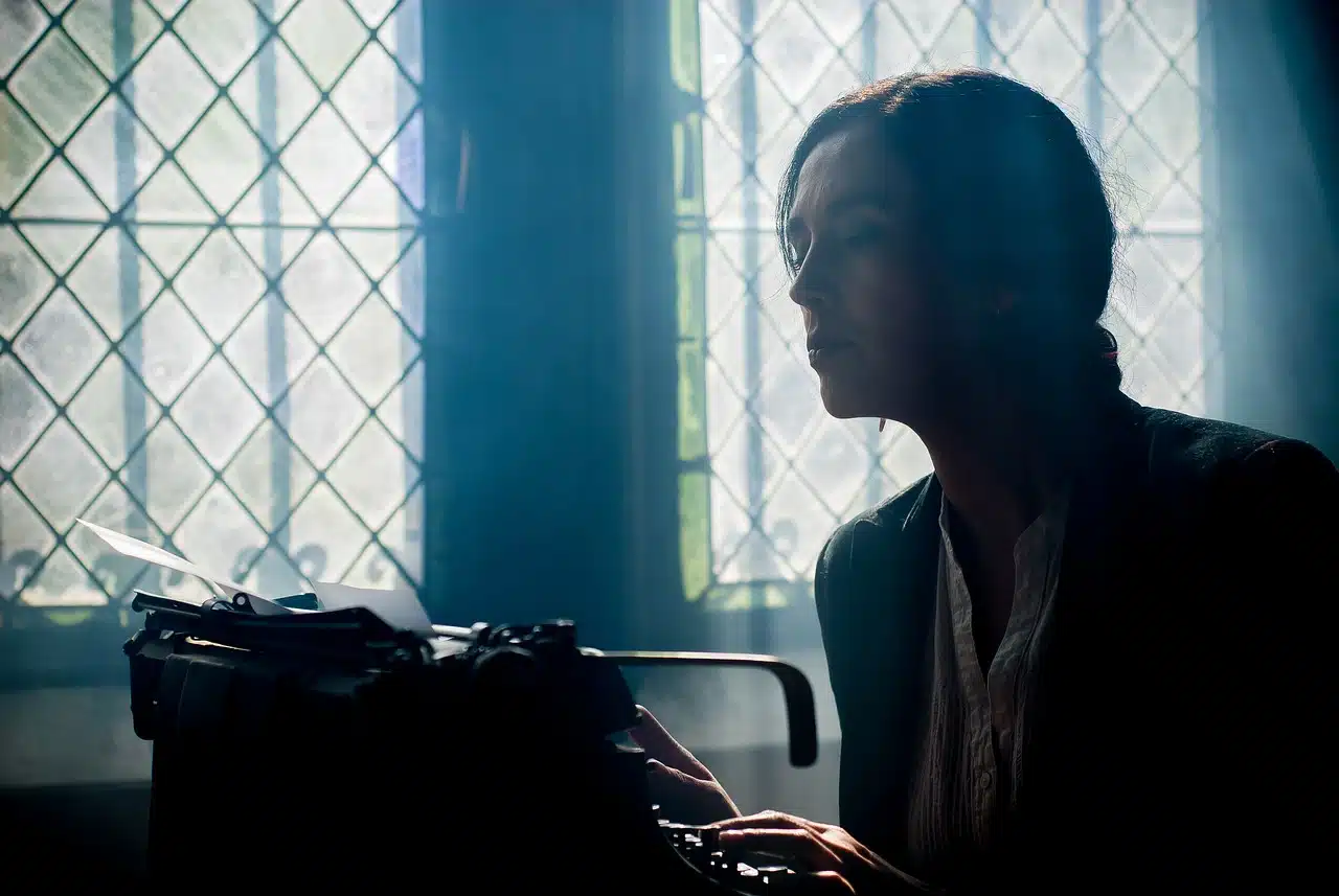 Writer working with her typewriter