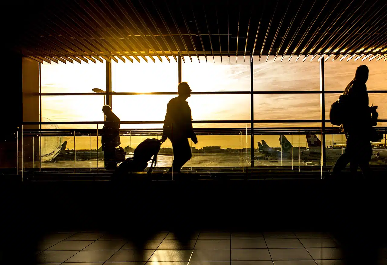 People walking through an airport