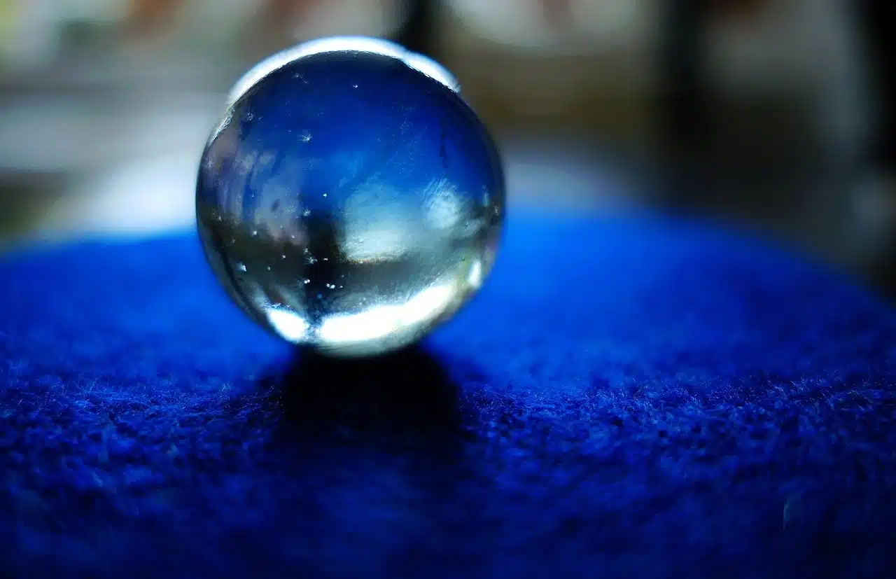 Crystal ball on blue table