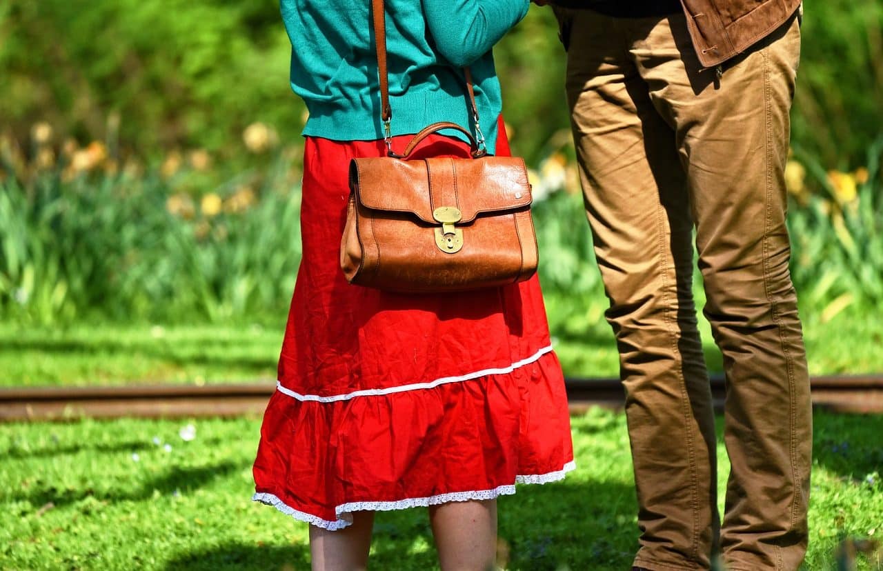 Woman and man talking in a park