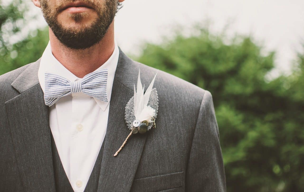 Man wearing lapel pin