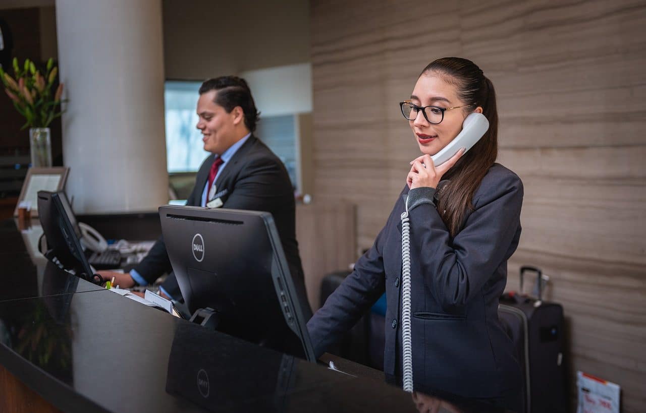 Two receptionists at their desk