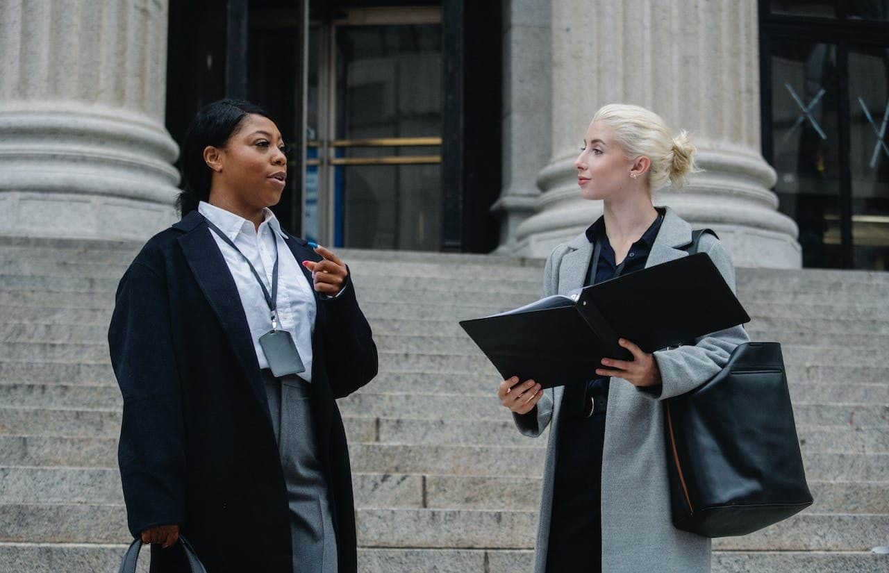 Two jurors outside the court