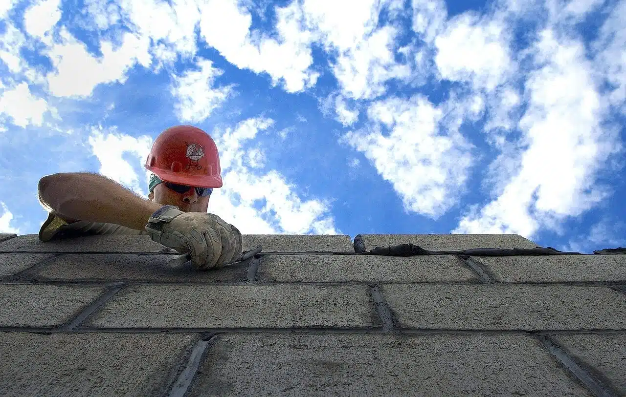 Bricklayer working on a wall