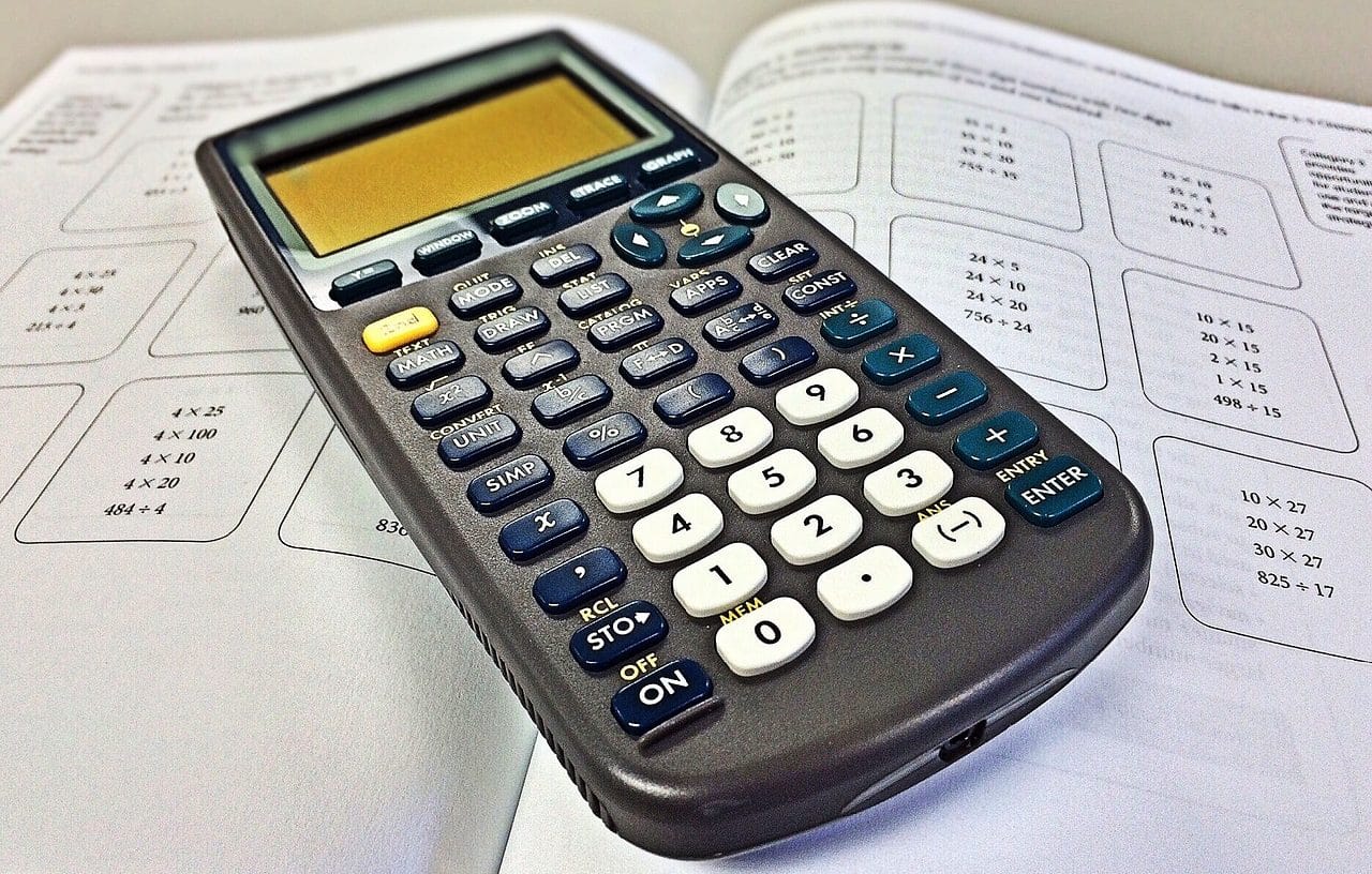 Calculator on math book