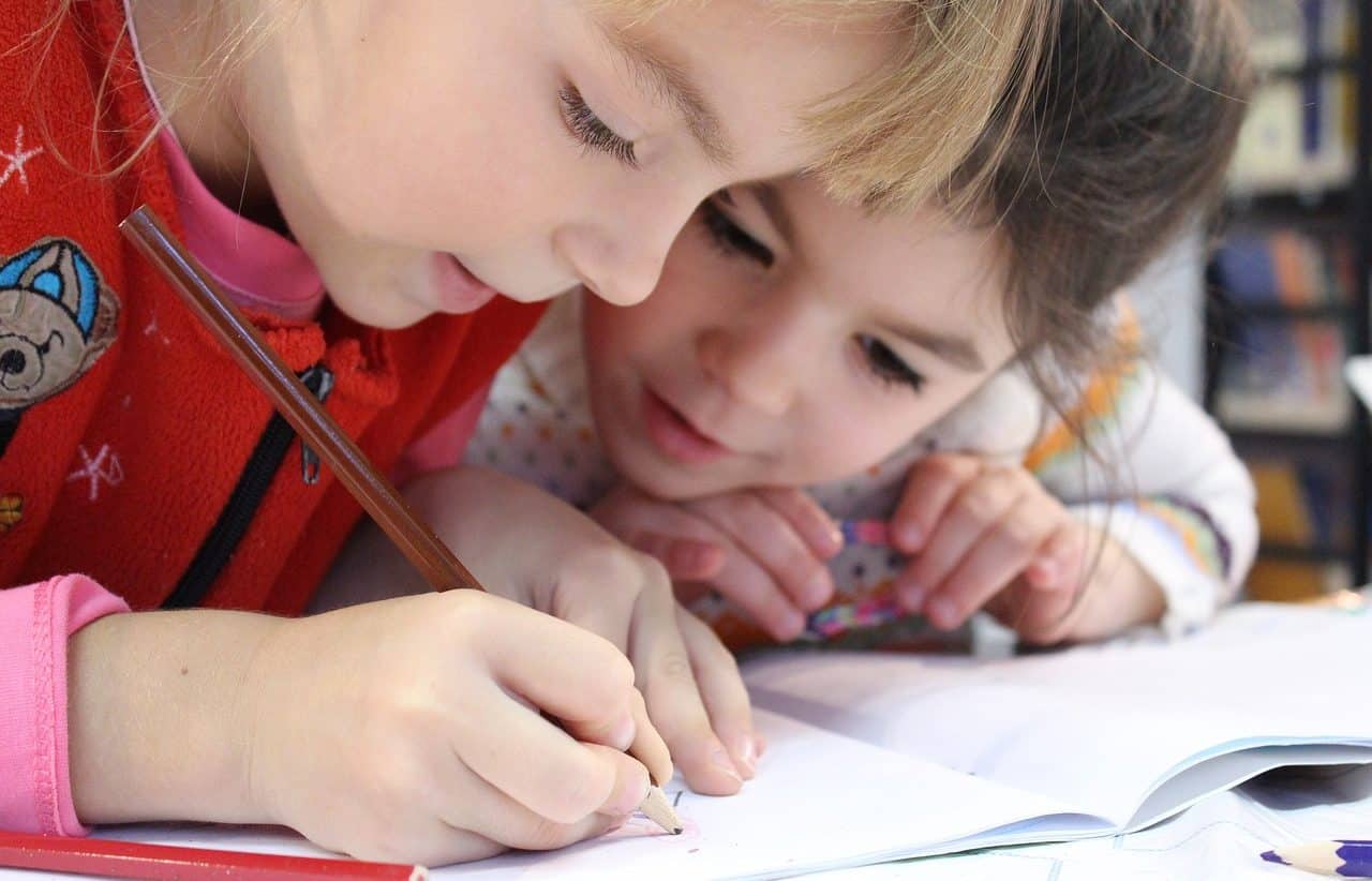 Two girls studying