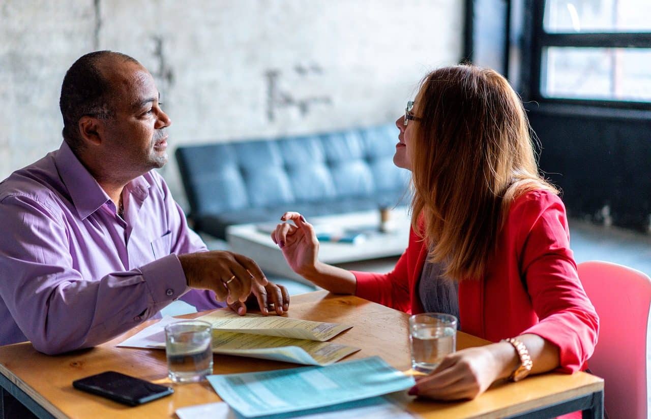 A woman arguing with a man