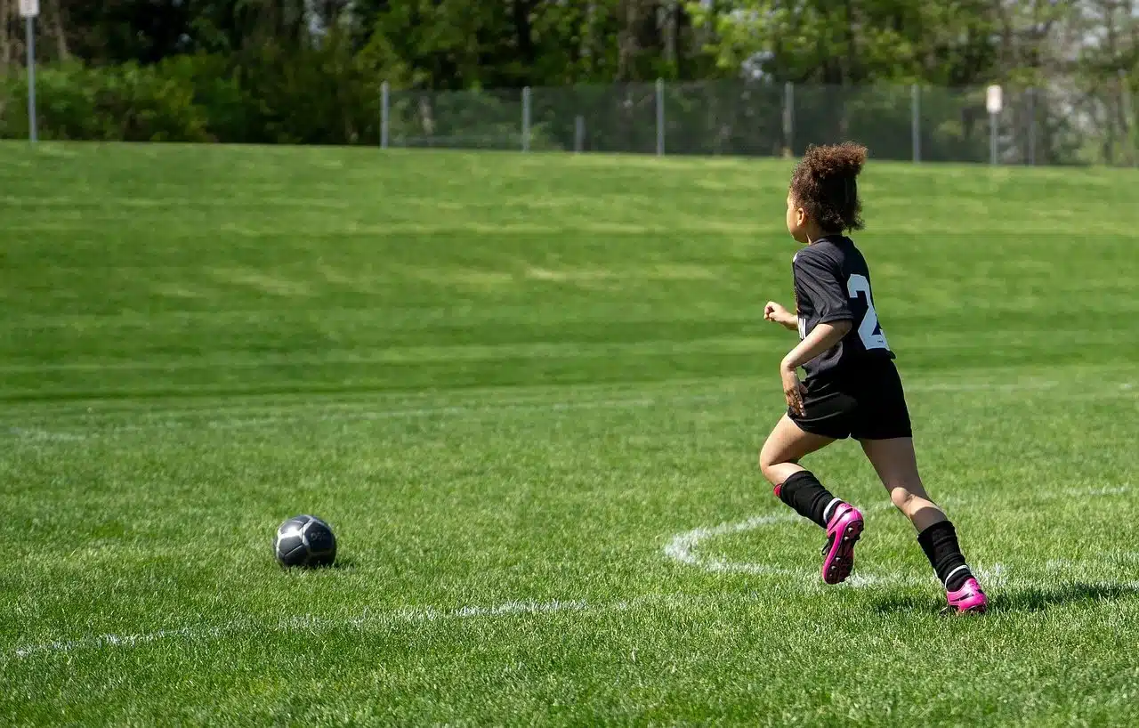 Boy playing soccer