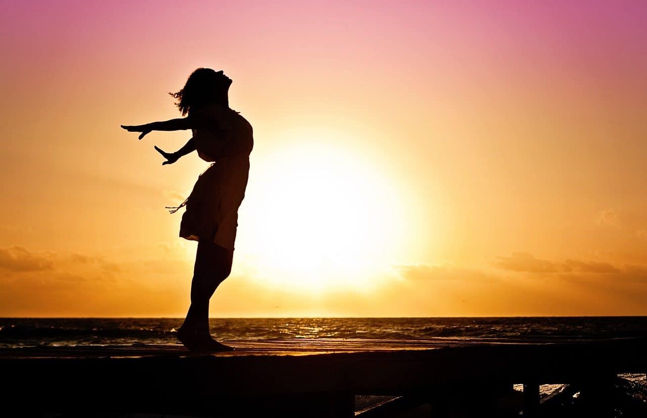 Woman stretching in the evening light