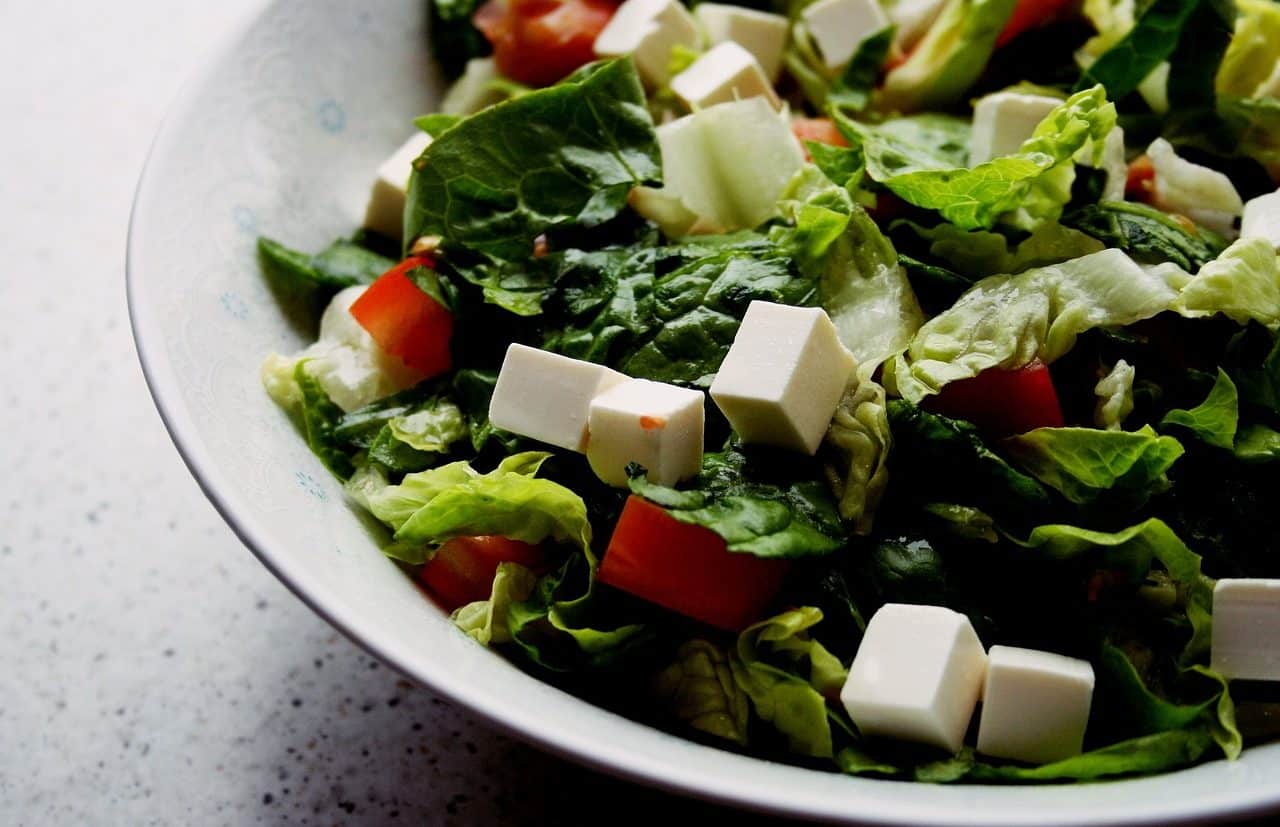 Salad plate with cheese cubes