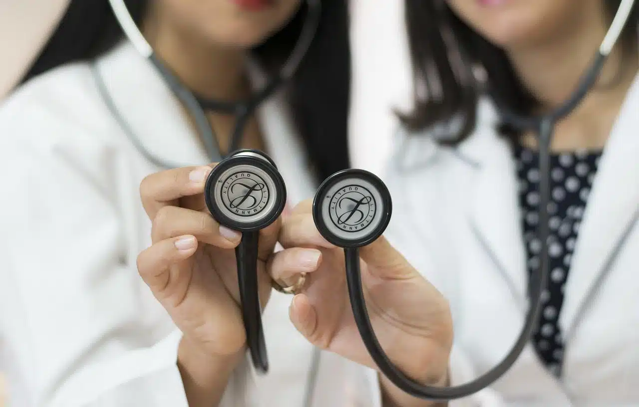 Two female medical doctors with stethoscopes