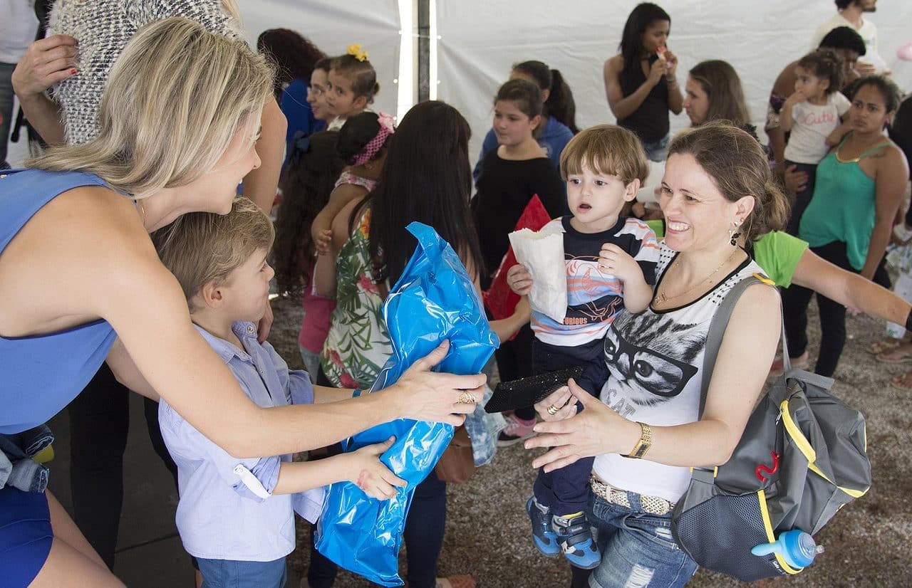 Women and children in humanitarian aid tent