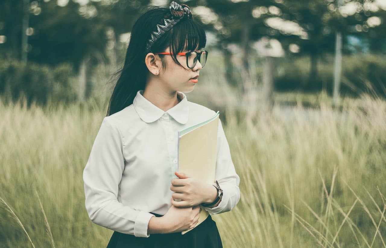 Oriental girl in school uniform