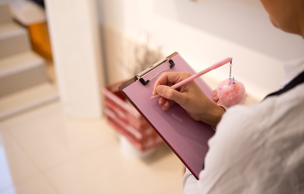 Woman writing in her notebook