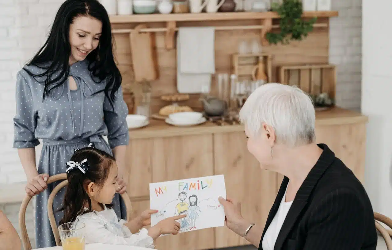 Social worker with girl and her mother