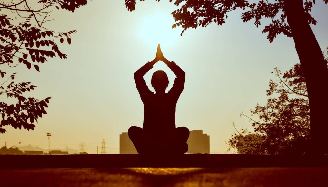 Woman doing meditation in nature.