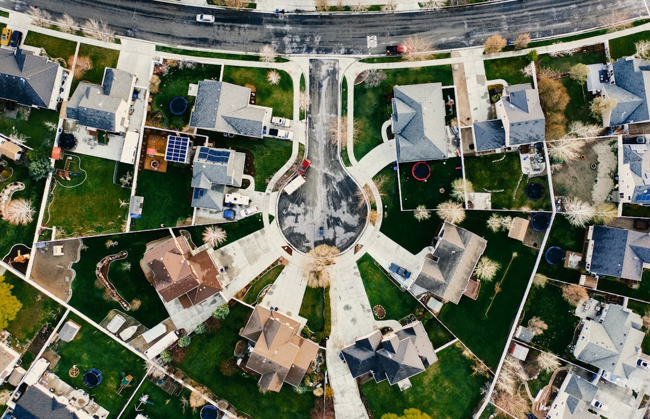 Aerial photo of a residential neighborhood with green spaces